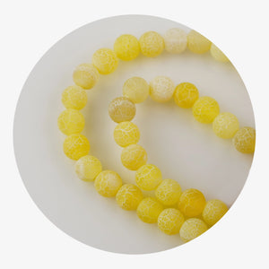 stone string beads yellow 2 tone