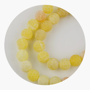 stone string beads yellow 2 tone