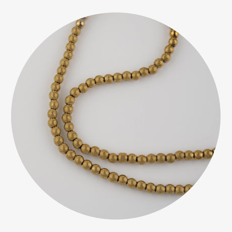 stone string beads metallic gold